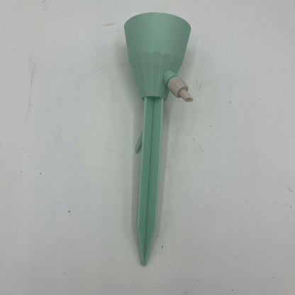 arrosoir gouttes à gouttes bleu turquoise vu de face